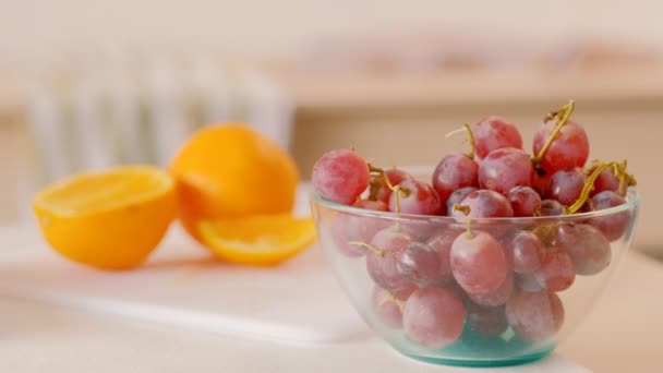 grapes oranges woman tray fresh smoothie apple - Video, Çekim