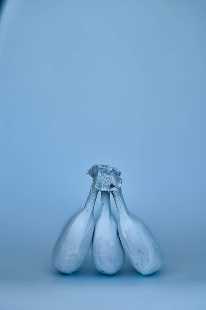 Blue bananas on blue background. Minimal style - Fotó, kép