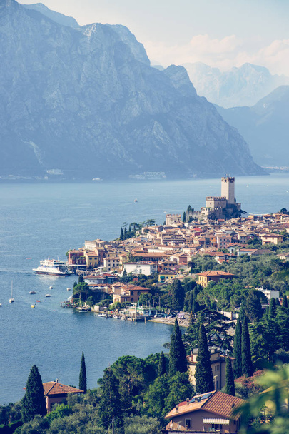 Idyllic coastline scenery in Italy: Blue water and a cute villag - Fotó, kép