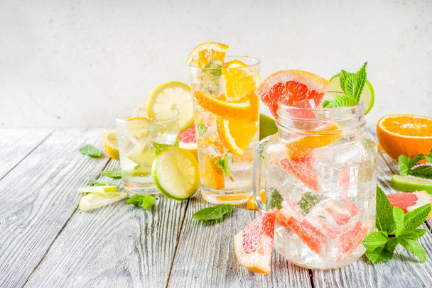 Four types of citrus lemonade or mojito  - Foto, imagen