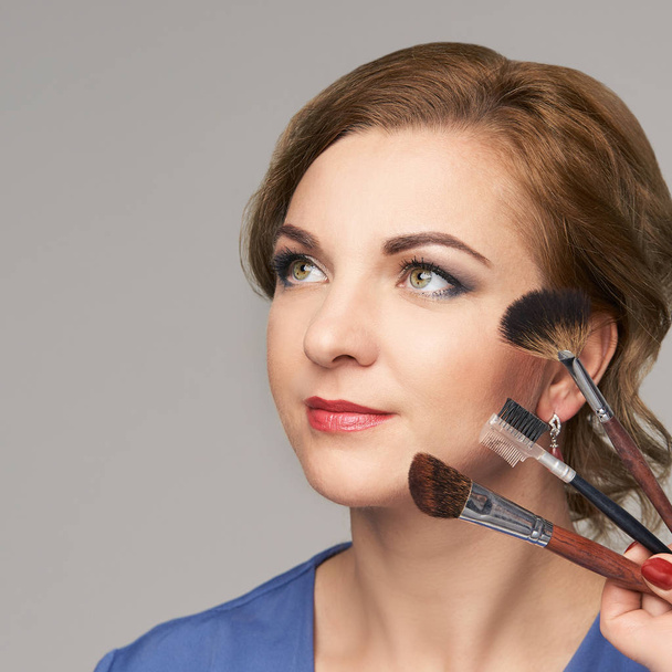 Woman make makeup. Face cosmetic. Skin care. Facial hightlighter. Mascara - Foto, Imagem