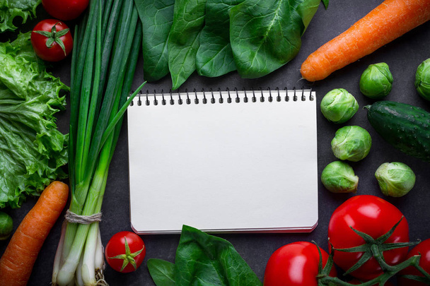 Blank recipe book and ripe ingredients for cooking fresh healthy - Фото, изображение