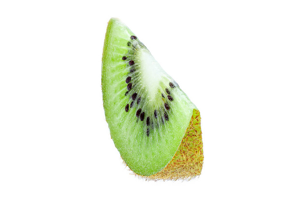 Isolated slice of ripe, green kiwi on white background  - Foto, Bild