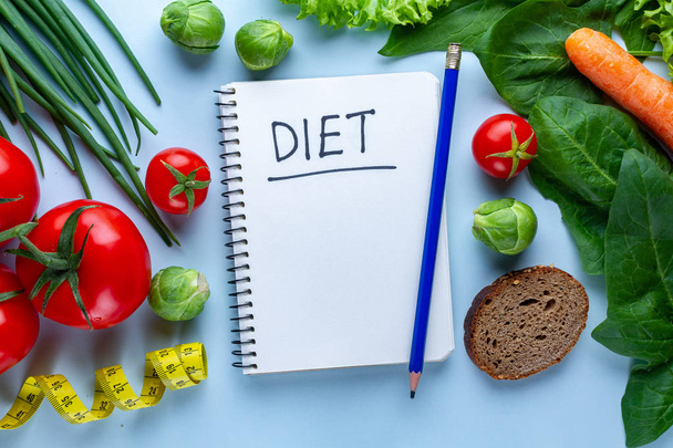 Diet and nutrition concept. Vegetables for cooking healthy dishes. Clean balanced food. Fitness, fiber eating and eat right. Copy space. Diet plan and control diary - Foto, Imagem