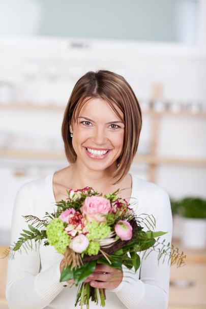 Portrait of a woman with flowers - Фото, изображение