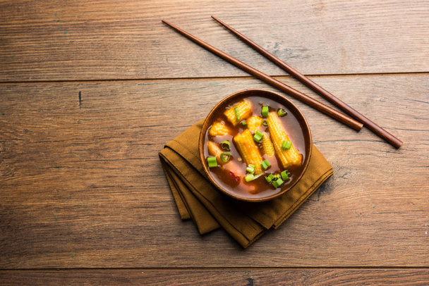 Baby-Mais-Mandschur mit Soße - beliebtes indo-chinesisches Rezept. Selektiver Fokus - Foto, Bild