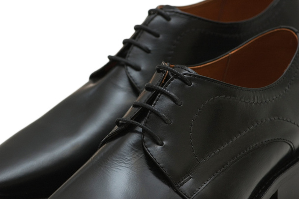 Sapatos pretos isolados no branco
 - Foto, Imagem