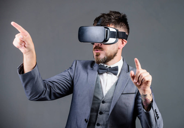Innovation in business. virtual reality goggles. Modern business. Digital future and innovation. bearded man wear wireless VR glasses. businessman in VR headset. Visual reality. use future technology - Фото, изображение