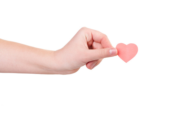 Hand with paper heart - Foto, afbeelding