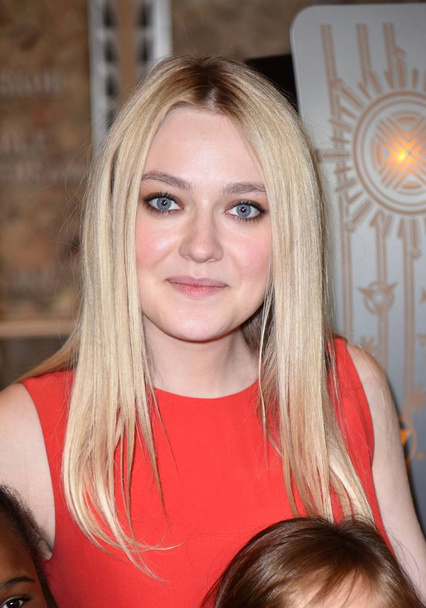 Dakota Fanning at a public appearance for Dakota Fanning Lights the Empire State Building in Red in Honor of Save the Children & International Day of the Girl, Empire State Building, New York, NY October 11, 2016. Photo By: Derek Storm/Everett Collec - Zdjęcie, obraz