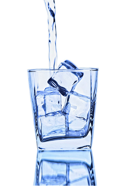 Pouring water in glass - Фото, зображення