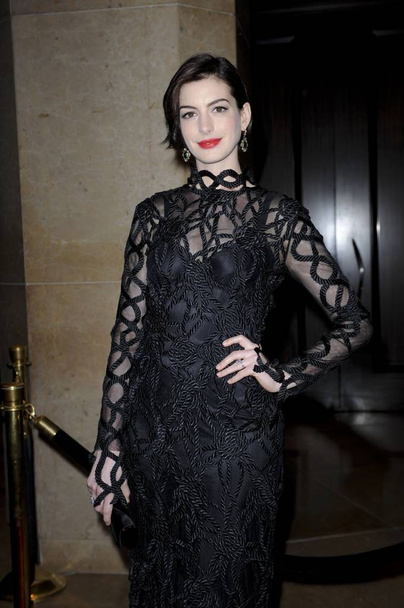 Anne Hathaway (wearing a Christopher Kane dress) in attendance for The 28th Annual American Cinematheque Award to Matthew McConaughey, The Beverly Hilton Hotel, Beverly Hills, CA October 21, 2014. Photo By: Elizabeth Goodenough/Everett Collection - Photo, Image