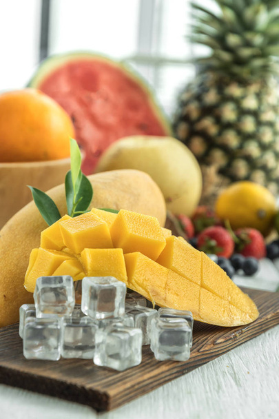 Famous Alphonso mango slices over wood background,Selective focu - Photo, Image