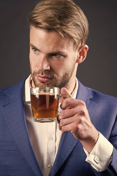 Businessman hold coffee or tea cup, hot drink - Фото, изображение