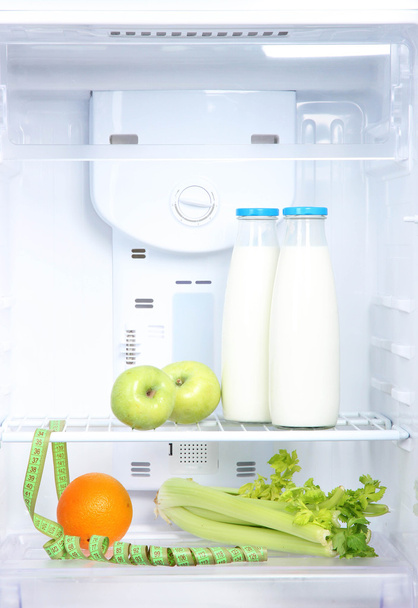 Open refrigerator with diet food - Foto, afbeelding