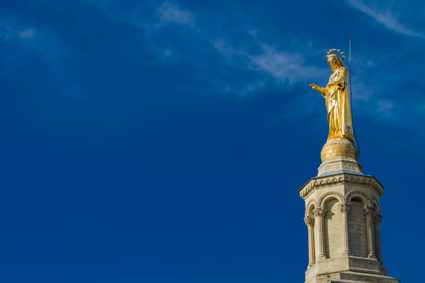 Gilded statue of Virgin Mary at Notre-Dame des Doms cathedral in - Fotografie, Obrázek