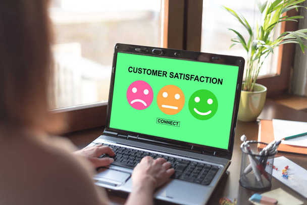Customer satisfaction concept on a laptop screen - Photo, Image