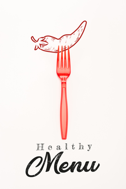 red plastic bright fork with chili pepper illustration and healthy menu lettering isolated on white  - Photo, Image