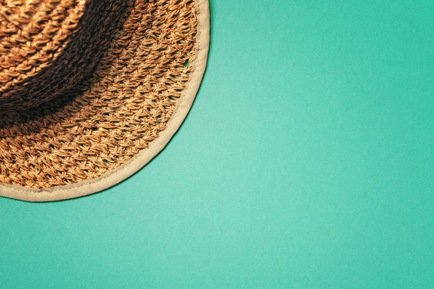 Female straw hat in summertime vacation concept - 写真・画像