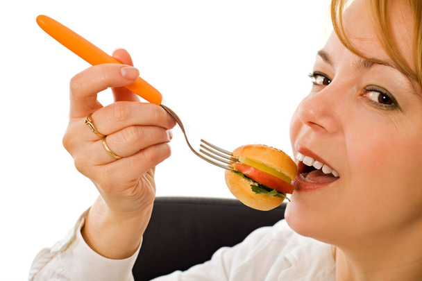 Young woman eating - Photo, Image