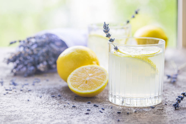 Lemonade with lemons and lavender - Photo, Image