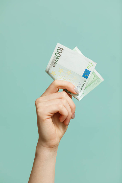 Business and Finances concept. Cash Money.  Woman holding euros money banknotes. - Foto, Imagem