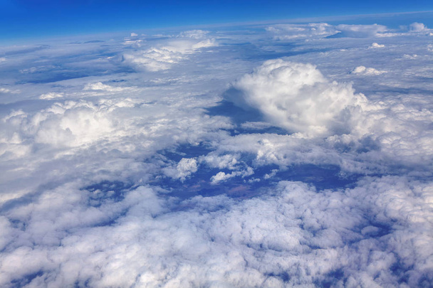  blue sky with clouds outer view from the airplane  - Foto, Imagen