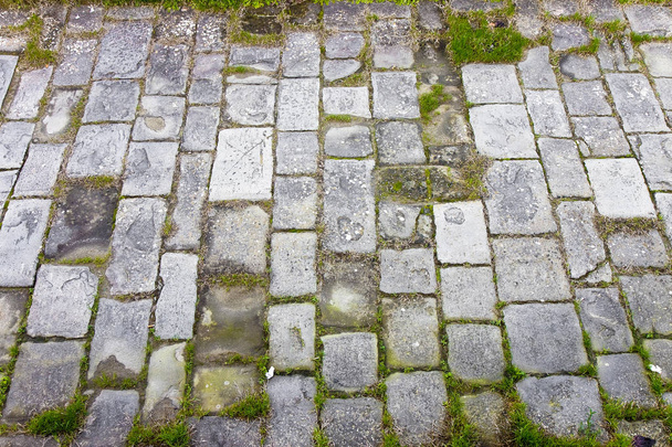 Typowy stary bruk Toskanii wykonane z rzeźbionych bloków kamiennych - Zdjęcie, obraz