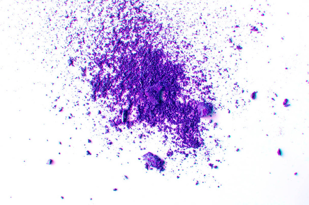 Lilac or purple eyeshadow, scattered crumbs isolated on white background, beauty and makeup concept - Φωτογραφία, εικόνα