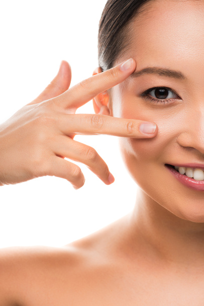 sourire asiatique fille avec parfait peau geste isolé sur blanc
 - Photo, image