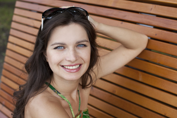 Happy young woman. Outdoor portrait - Фото, зображення