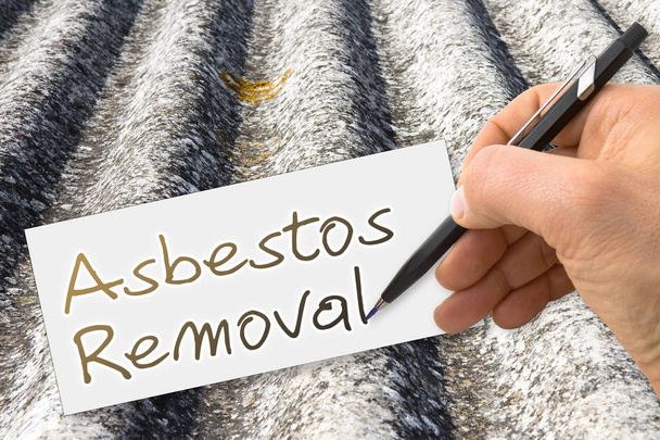 Ručně psaný "odstraňování azbestu" s tužkou na prostěradli - Fotografie, Obrázek
