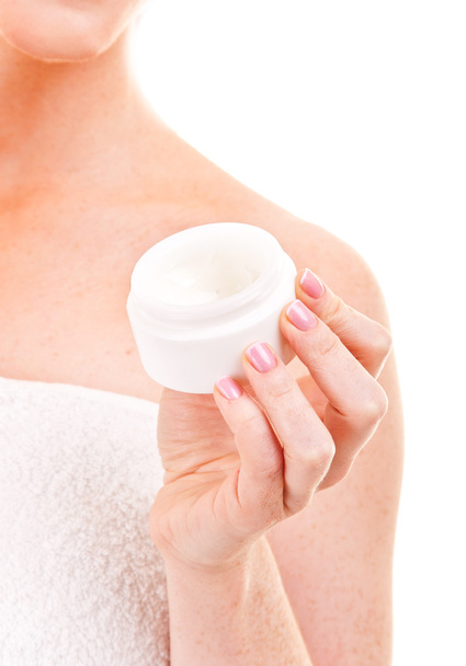 Woman hand holding facial cream - Fotografie, Obrázek