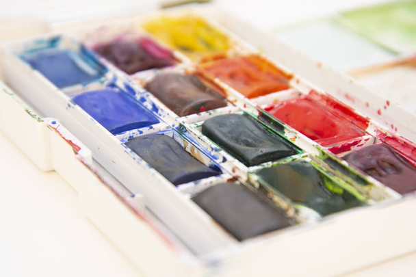 Set of watercolor paints isolated for painting closeup. Selective focus. Art, creative background with copy space. - Foto, immagini