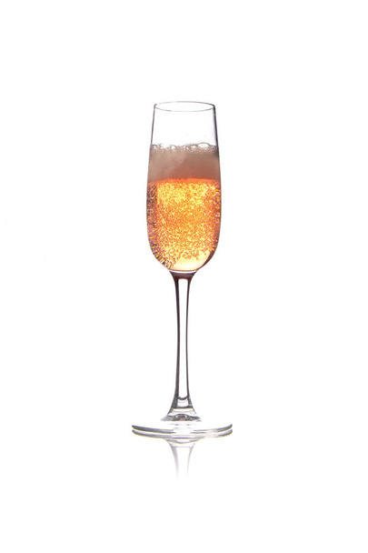Rose pink champagne glass with bubbles isolated on white background - Photo, Image