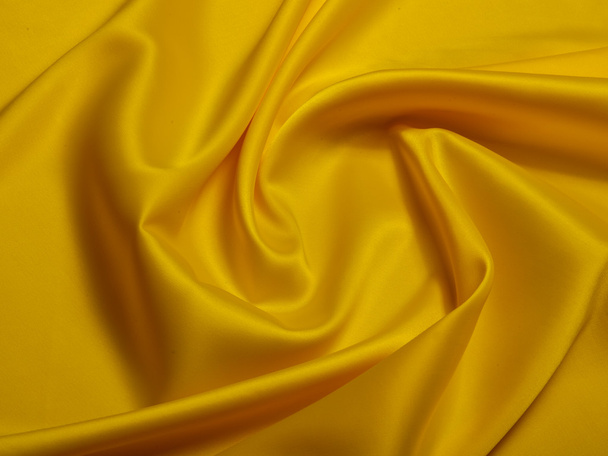 tkanina soft towarów, odcienie żółtego. - Zdjęcie, obraz