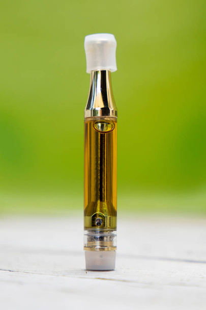 Cannabis oil, for smoking marijuana in a vaporizer or electronic cigarette  - Photo, Image