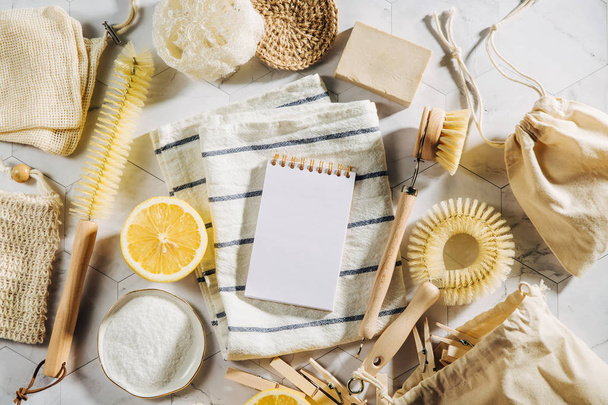 Natural cleaning products lemon, bamboo dish brushs with notebook. Eco friendly. Zero waste concept. Plastic free. - Foto, afbeelding