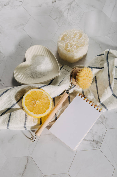 Natural cleaning products lemon, bamboo dish brushs with notebook. Eco friendly. Zero waste concept. Plastic free. - Foto, afbeelding