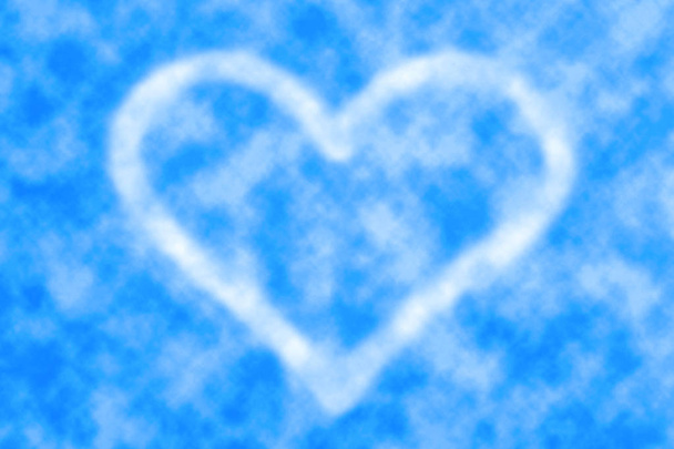 Beautiful realistic fluffy cloud in shape of heart in center of blue sky at clear day. Natural background with heart cloud with copy space. Love symbol close-up. Valentine day image in pastel tones. - Photo, Image