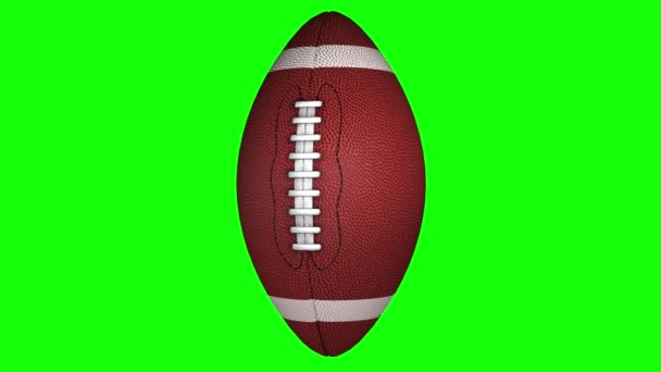 3D animation of american football ball rotating on transparent background. - Кадры, видео