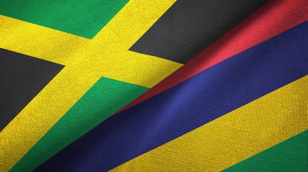 Jamajka i Mauritius dwie flagi tkanina tekstylna, tekstura tkaniny - Zdjęcie, obraz
