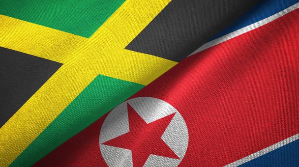 Jamaica and North Korea two flags textile cloth, fabric texture - Photo, Image