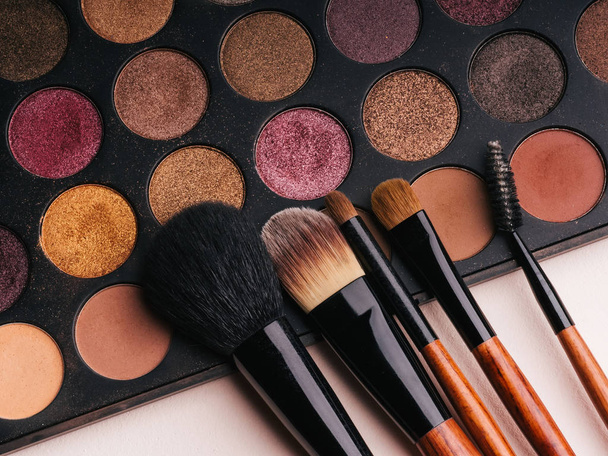 makeup brush set and professional eye shadow palette - Photo, Image