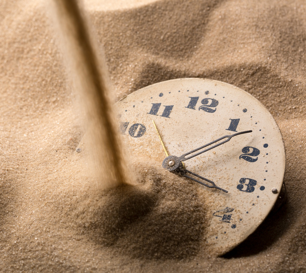 Face of clock in sand - Photo, Image