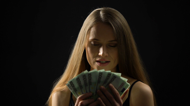 Beautiful woman stroking body with euros, enjoying income, lottery jackpot - Footage, Video