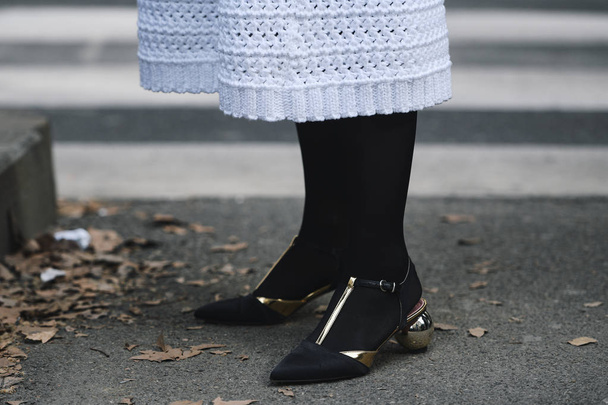 Milan, Italy - February 24, 2019: Street style Shoes detail after a fashion show during Milan Fashion Week - MFWFW19 - Foto, afbeelding