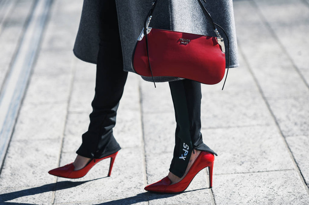 Milan, Italy - February 22, 2019: Street style outfit - Prada purse after a fashion show during Milan Fashion Week - MFWFW19 - Foto, Imagem