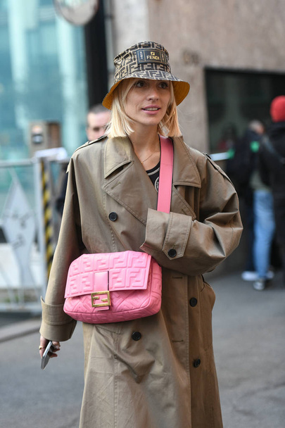 Milan, Italy - February 21, 2019: Street style Woman wearing Fendi after a fashion show during Milan Fashion Week - MFWFW19 - 写真・画像