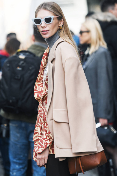 Milan, Italy - February 22, 2019: Street style outfit - models, bloggers and influencers before a fashion show during Milan Fashion Week - MFWFW19 - Fotó, kép